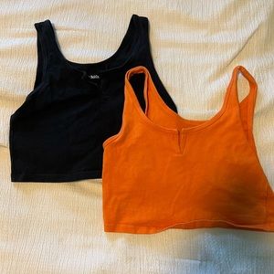 Two target tank tops